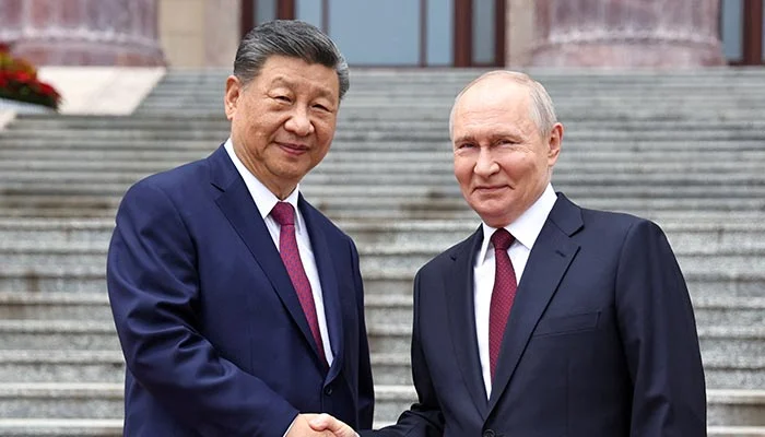 Xi